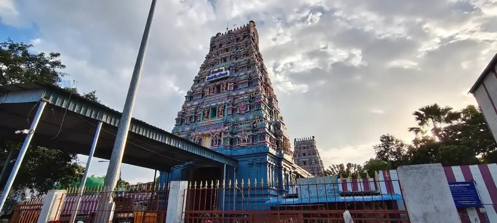 Historic Hindu temple gopuram under a cloudy sky Historic Hindu temple gopuram under a cloudy sky
